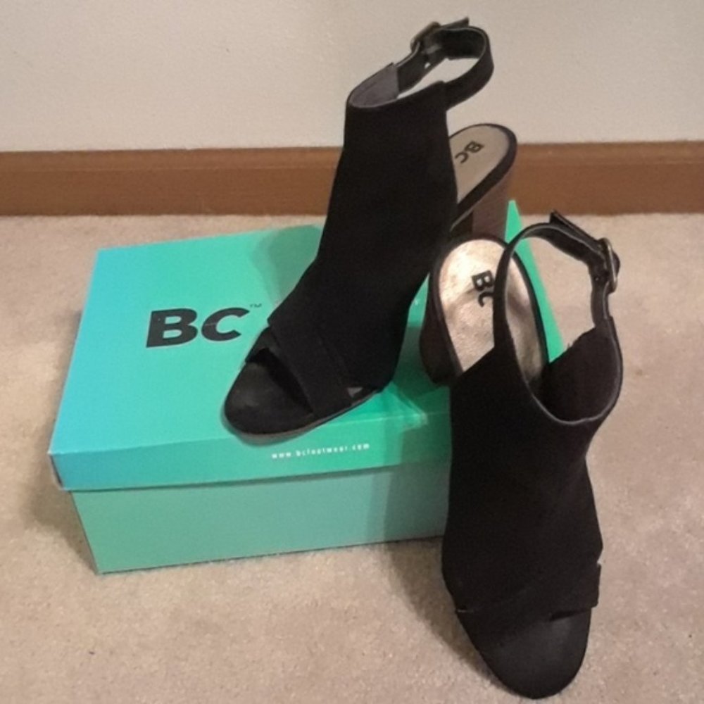 Open toe black leather heels